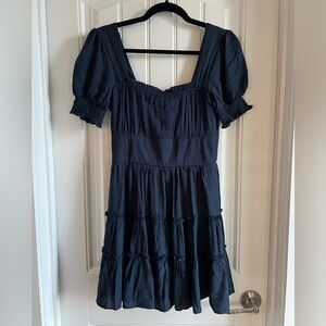 Navy blue puff sleeve mini dress.